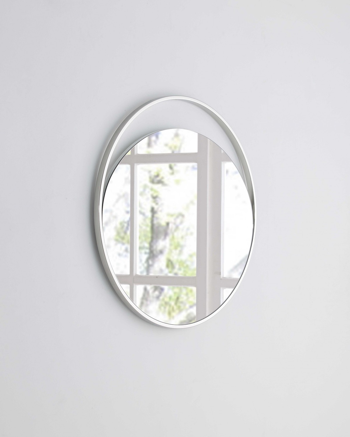 Medium Round Mirror In Matte White. Polished Stainless Steel Frame