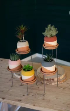 Set Of Five Color Dipped Clay Pots With Metal Bases