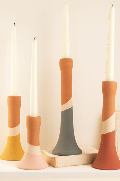 Set Of Four Clay Multi Color Striped Taper Candle Holders