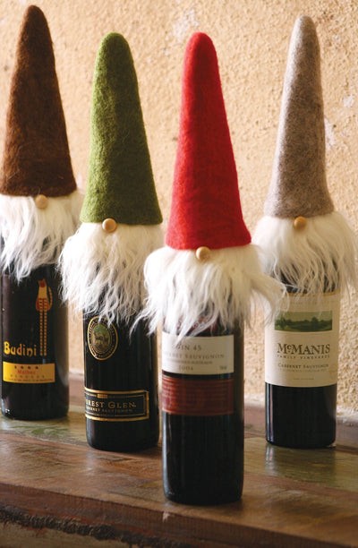 Set Of Four Felt Santa Wine Toppers With Wispy Beards