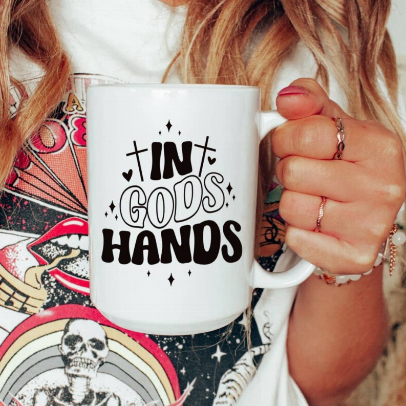 In God's hands ceramic coffee mug