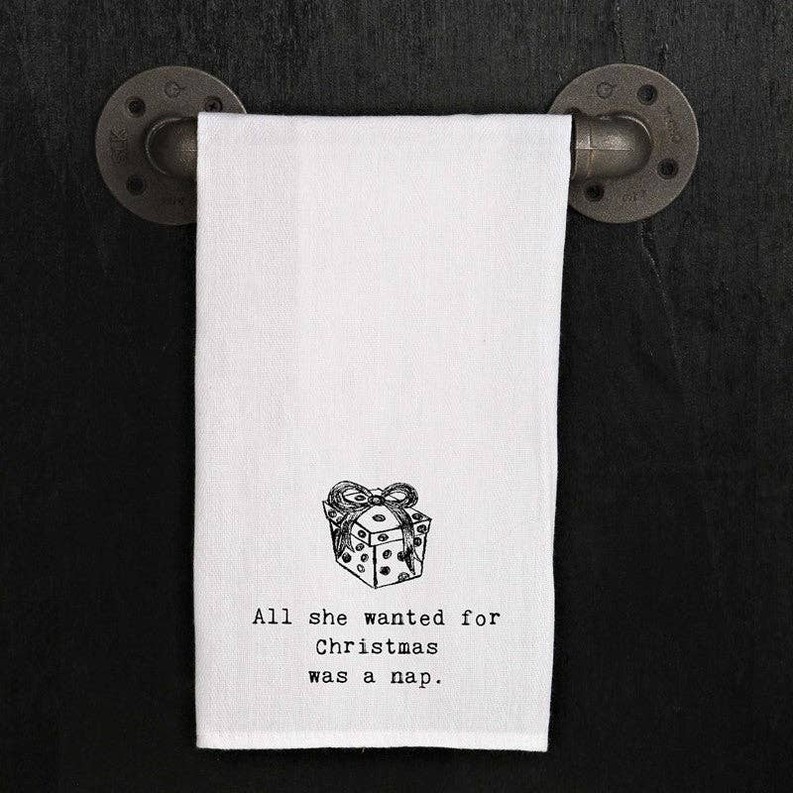 All she wanted for Christmas was a nap. / Kitchen Towel