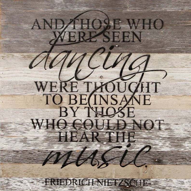 And those who were seen dancing...  Wall Sign
